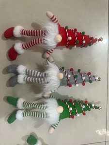 Three Christmas gnomes with sequined hats and LED lights in red, grey, and green colors
