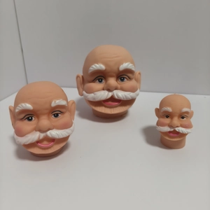 Three sizes of vinyl Santa Claus head figurines with white beards for DIY decorations