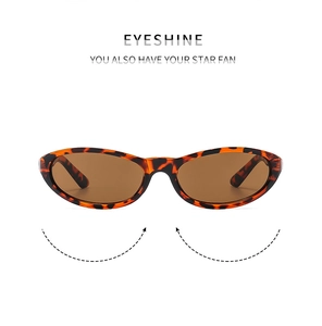 Detail shot of retro leopard tortoise shell cat eye sunglasses with dark brown lenses