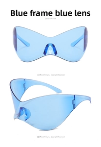 Detail view of blue Y2K futuristic wrap-around sunglasses with printed frame codes
