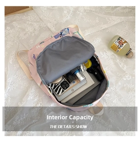Detail showing the internal storage capacity of the pink butterfly print backpack