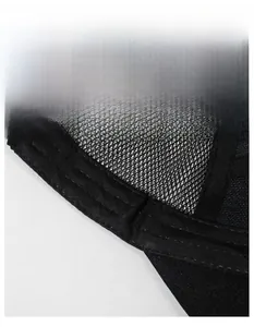 Detail of widened sweatband and breathable mesh lining inside black sports cap