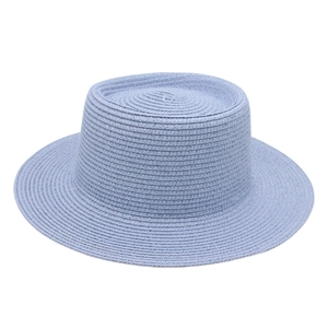 Close-up of light blue woven straw boater hat with fine texture and classic flat brim