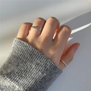 Detail of S925 sterling silver double layer twisted rope open ring on index finger