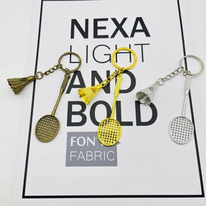 Miniature metal badminton racket keychain set in gold, silver, and bronze finishes