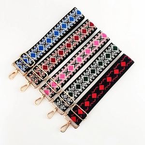 Ethnic embroidered wide bag straps with colorful diamond patterns and gold metal buckles