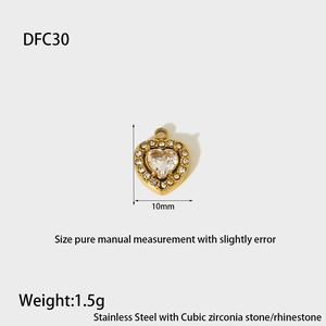 Macro shot of 10mm gold heart charm in stainless steel with cubic zirconia stones