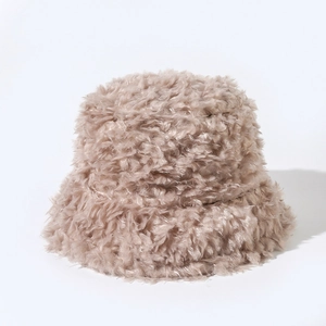 Close-up of fluffy plush bucket hat in beige showing soft winter texture