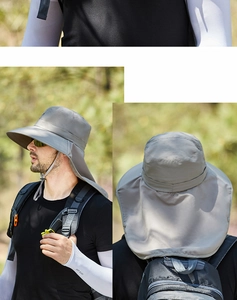 Detail of wide brim grey sun hat with neck flap and adjustable chin strap for outdoors