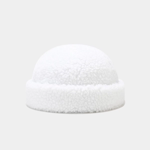 Detailed close-up showing the soft texture of a white sherpa fleece miki hat