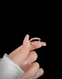 Macro detail of S925 sterling silver ring with marquise cut sparkling cubic zirconia