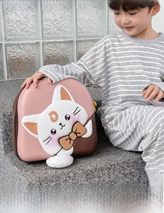 Detail of pink and brown EVA hard shell toddler backpack featuring a 3D cat head with crescent