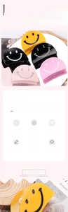 Detail of acrylic smiley face hair claw clip with white rhinestones and pastel colors