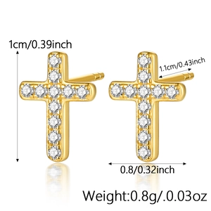 Detail view of gold cross stud earrings with cubic zirconia and size measurements