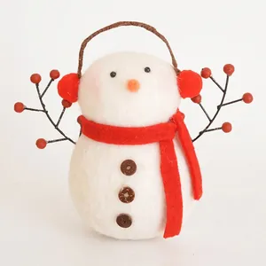 Plush wool felt snowman Christmas ornament with red earmuffs and scarf for festive holiday decor