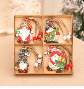 Set of 4 Christmas wooden gnome ornaments with beads and jute rope in a rustic wooden box