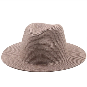Detailed view of the fine woven texture on this brown wide brim straw fedora beach hat