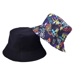 Double-sided reversible bucket hat with black solid and colorful graffiti print