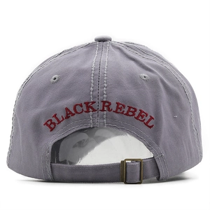 Detail of adjustable metal buckle and red embroidery on gray distressed baseball cap