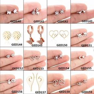 Variety set of stainless steel earrings featuring snowflake, deer and heart designs
