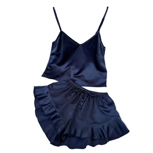 Navy blue silk satin pajama set with V-neck camisole and ruffled hem shorts for women