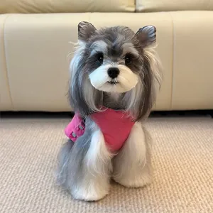 Pink quilted warm pet vest for small dogs featuring side buttons and reversible design