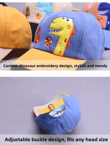 Detail of adjustable metal buckle and cartoon dinosaur embroidery on cotton kids baseball cap