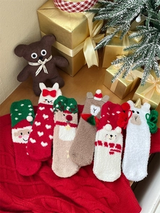 Detailed set of six festive coral fleece Christmas socks with cute 3D cartoon characters