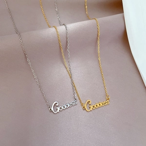 Minimalist goddess letter pendant necklaces in gold and silver finish on silk fabric