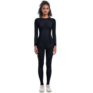 Detail of black seamless knit ski wear set with compression texture and breathable mesh
