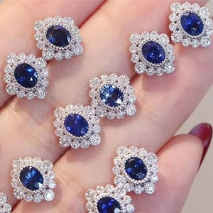 Elegant vintage sapphire blue zircon earrings with square floral diamond halo design