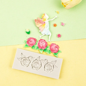 Détail du moule en silicone rose et fée pour la création de fondant et chocolat