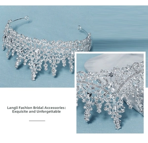 Close-up of luxury silver bridal crown featuring teardrop purple crystals and white rhinestones
