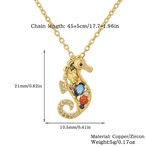 Detail view of golden seahorse pendant with size specs and colorful zircon stones