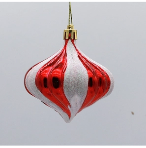 Detail of red and white glitter spiral onion ball ornament with golden hanging string