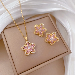 Elegant gold titanium steel necklace and earrings set with pink flower and crystals