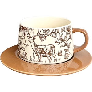 Retro ceramic coffee cup and saucer set with brown deer and floral pattern on beige base