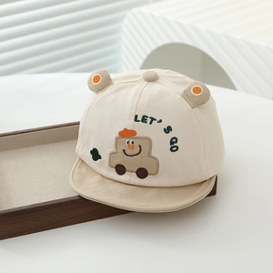 Detail of baby baseball cap featuring cartoon car embroidery and cute small 3D ears