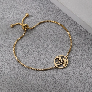 Adjustable golden stainless steel slider bracelet with tropical palm tree hollow pendant