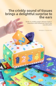 Detail of infant tissue box toy with sensory crinkle tissues and colorful patterns
