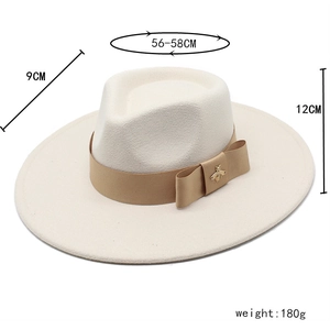 Detail of wool fedora hat with beige ribbon and bee charm showing exact dimensions