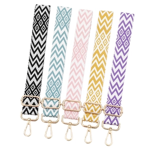 Adjustable colorful jacquard woven bag strap with geometric patterns and gold clips