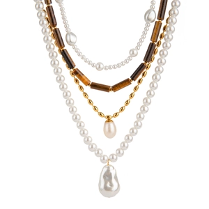 Layered stainless steel necklace with white pearls, tiger eye beads and baroque pendant