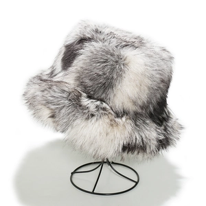 Close-up of marble grey faux fox fur bucket hat showing soft fluffy texture and ear protection