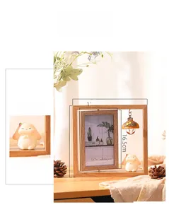 Close-up of a rotating 6-inch wooden photo frame with cute rabbit and hanging light bulb