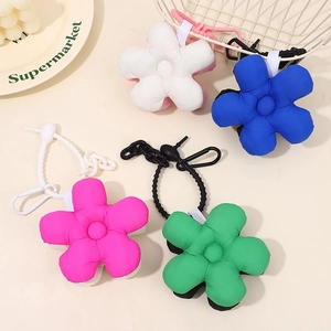 Cute puffy five-petal flower charms in white, blue, pink and green for bags and keys