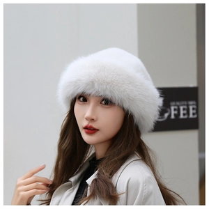 Detailed close-up of premium white faux fur texture on a warm winter beret for women