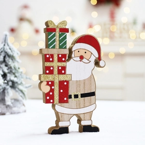 Festive wooden Santa Claus figurine holding glittery gift boxes for Christmas decor