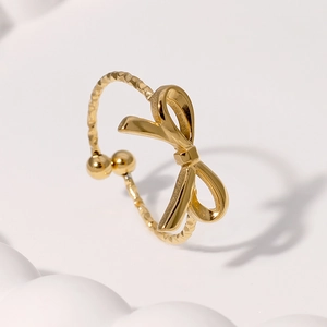 Bague ouverte minimaliste en acier inoxydable doré avec un nœud papillon élégant