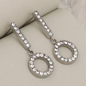 Silver geometric tassel earrings with micro-paved rhinestones in a luxury jewelry box